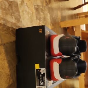 Air Jordan Retro 11 Black and Red Sneakers